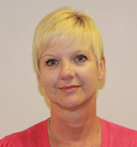 Headshot of Julie.